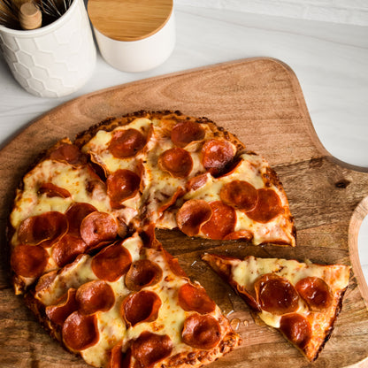 Nate's Nectar Hot Honey drizzled on pizza, hot honey pizza