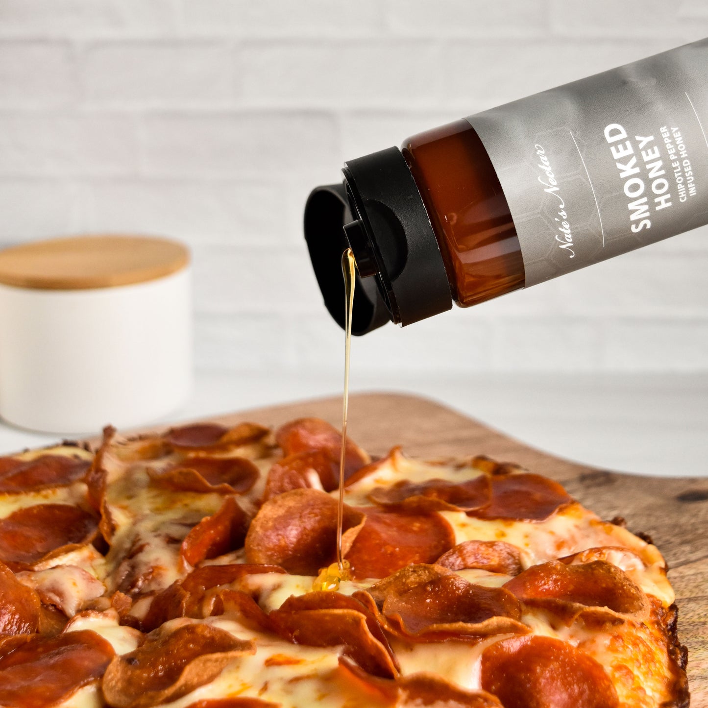 Nate's Nectar Smoked Honey, Hot Honey, Chipotle pepper infused natural honey, smoked honey drizzled on pizza, hot honey pizza